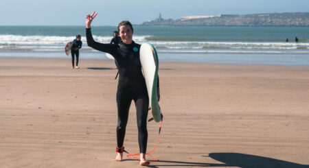 Happy Surfer coming from Surf lesson in Essaouira Bay