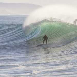 Surfer riding the waves in Morocco