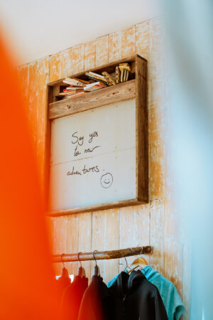 Say yes to new adventures sign in Loving Surf Shop in Essaouita, Morocco.